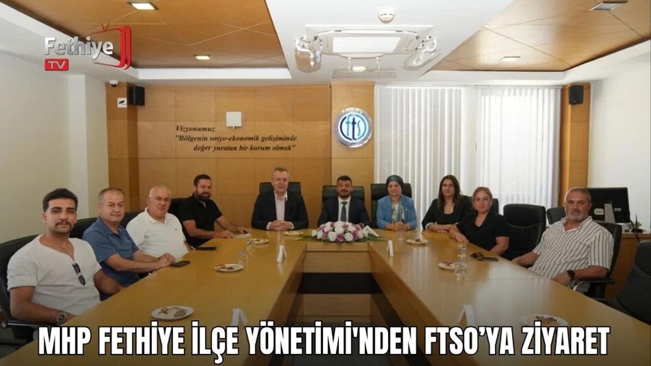 MHP Fethiye ilçe yönetimi, FTSO Yönetim Kurulu Başkanı Osman Çıralı'yı ziyaret ediyor.