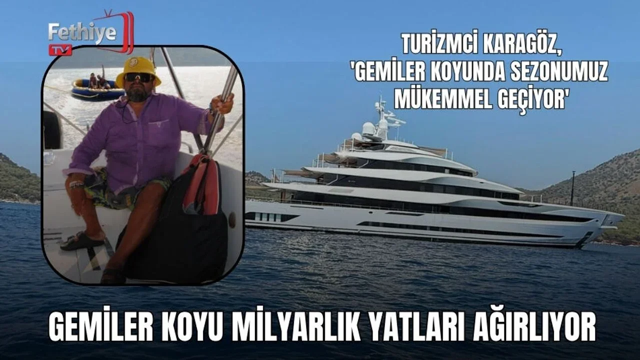 Gemiler Koyu'nda lüks mega yatlar ve turistler, masmavi denizde jet ski keyfi yapıyor.