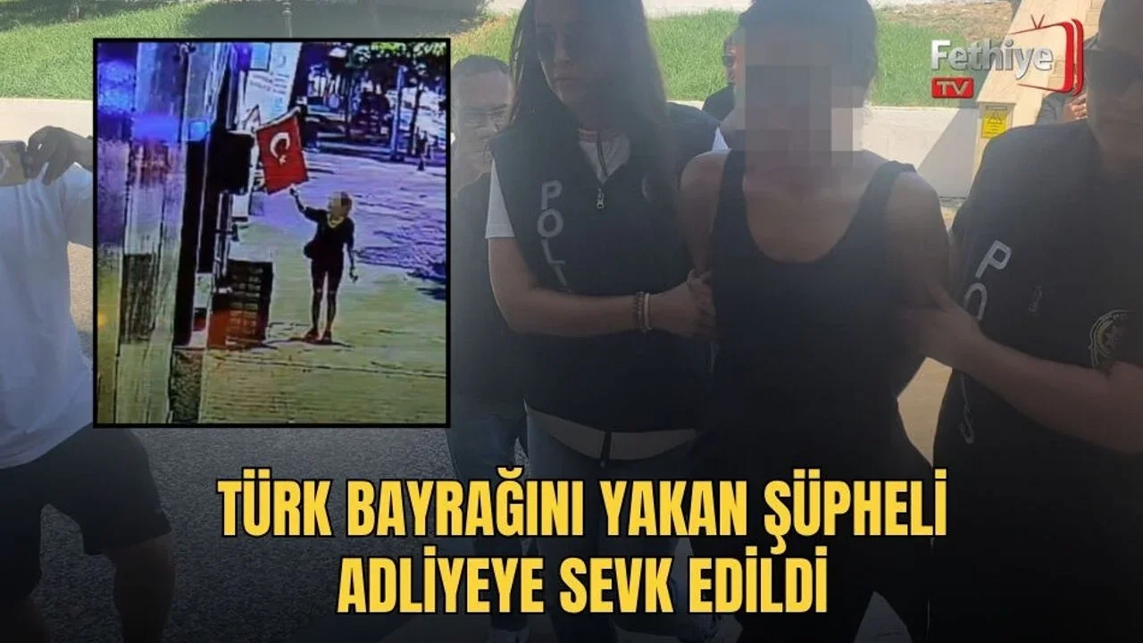 Menteşe'de iş yeri önündeki Türk bayrağını çakmakla yakmaya çalışan kadın güvenlik kamerasına yansıdı.
