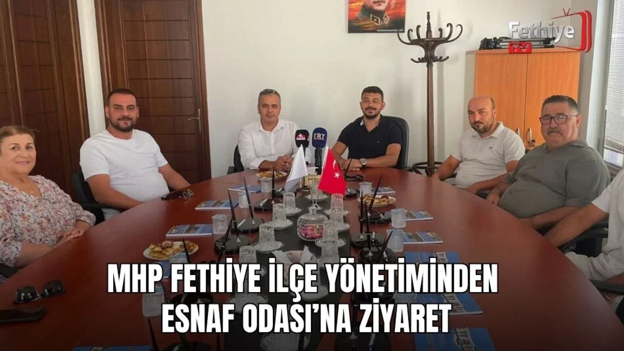 MHP Fethiye İlçe Başkanı Tuğrul Nasuhi Öztürkçü, Fethiye Esnaf Odası Başkanı Kamil Mutlu Demirtaş'ı makamında ziyaret etti.