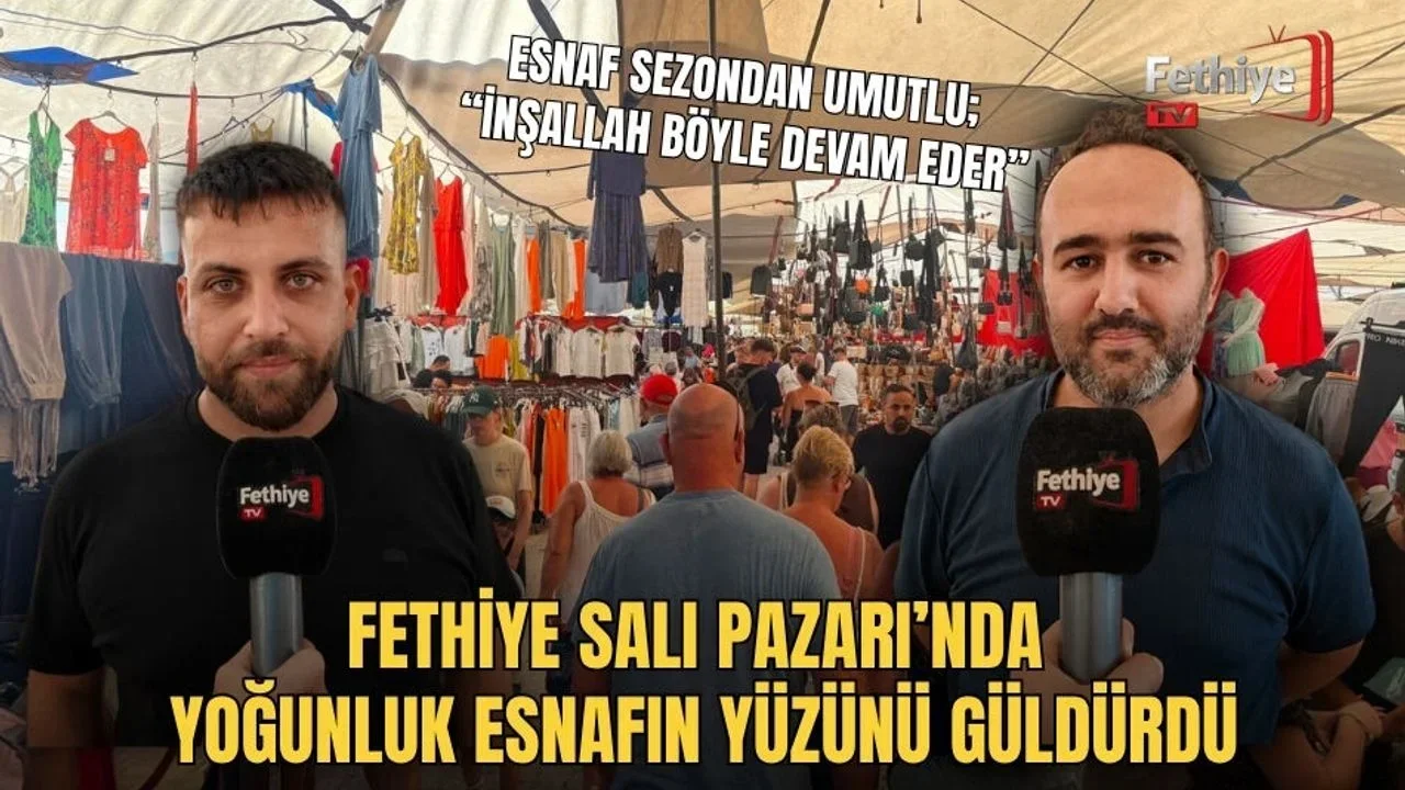 Fethiye Salı Pazarı'nda tuhafiye ve giyim bölümünde alışveriş yapan kalabalık vatandaşlar