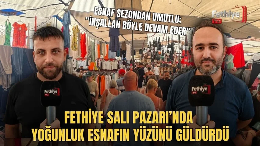 Fethiye Salı Pazarı'nda tuhafiye ve giyim bölümünde alışveriş yapan kalabalık vatandaşlar