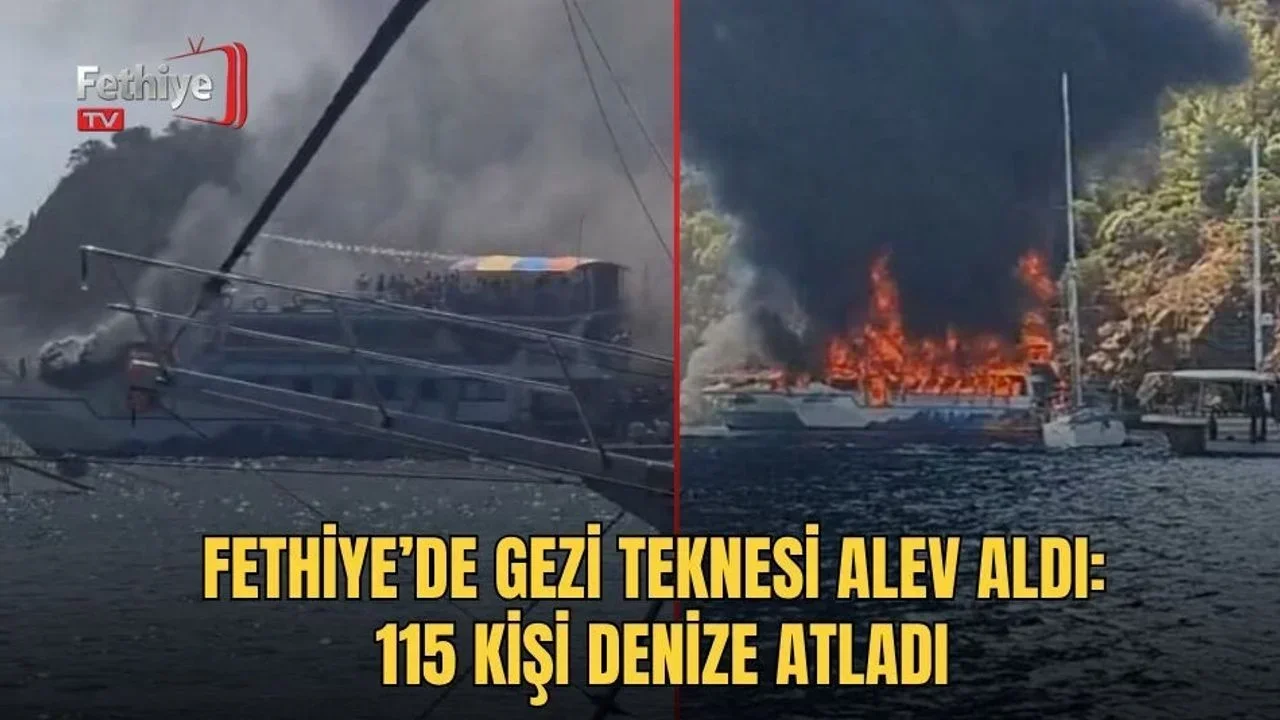 Fethiye açıklarında gezi teknesinde çıkan yangın sonrası yolcular can yelekleriyle denize atlıyor.