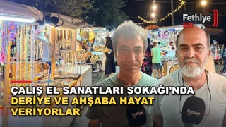 Fethiye Çalış'ta deri sanatçısı ve ahşap oyma ustası el emeği ürünlerini sergiliyor.