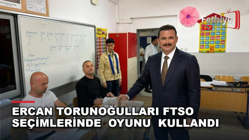 Fethiye Ticaret ve Sanayi Odası seçimlerinde oy kullanan Ercan Torunoğulları ve adaylar.