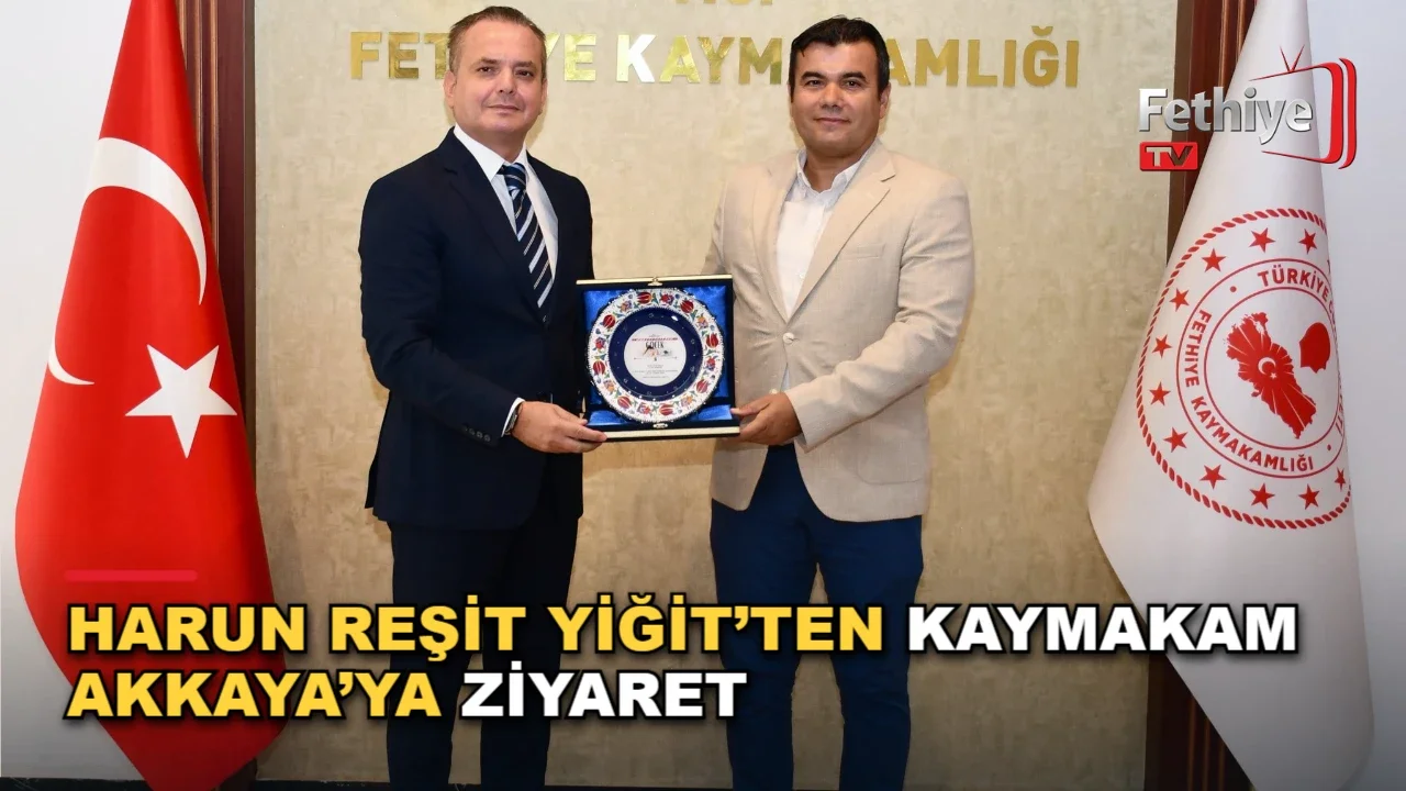 Fethiye Kaymakamı Fatih Akkaya, Gençlik ve Spor İlçe Müdürü Harun Reşit Yiğit'i makamında kabul etti