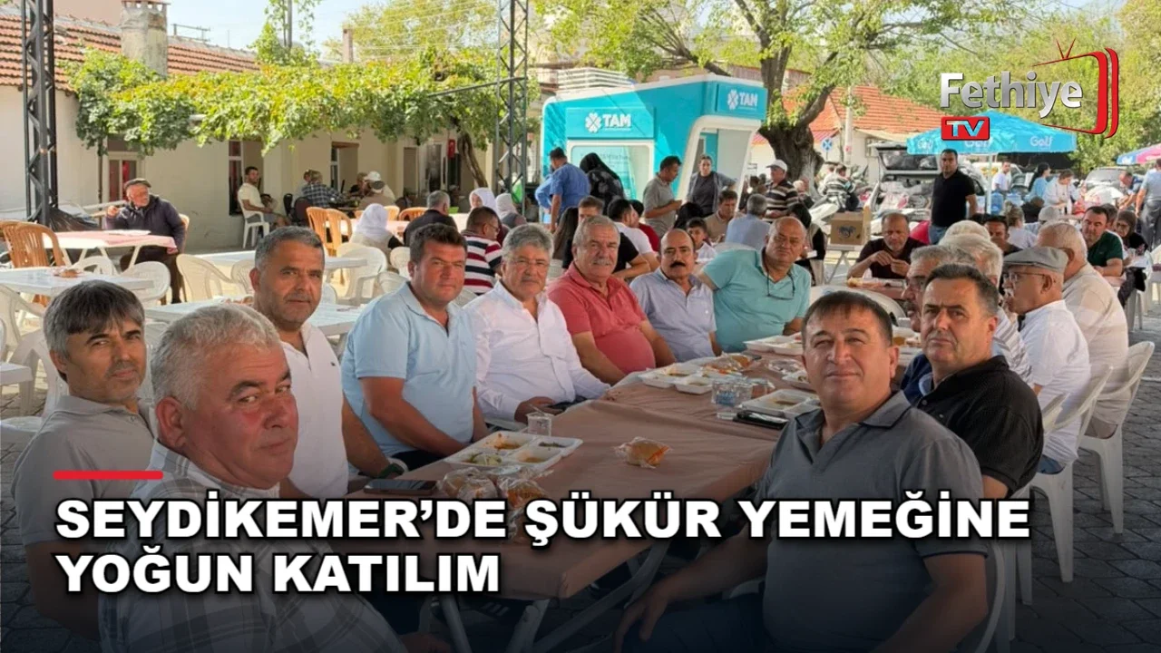 Seydikemer Eşen Mahallesi'nde düzenlenen şükür yemeğinde vatandaşlar bir araya geldi