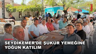 Seydikemer Eşen Mahallesi'nde düzenlenen şükür yemeğinde vatandaşlar bir araya geldi