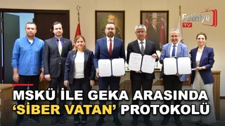 MSKÜ Rektörü Turhan Kaçar ile GEKA Genel Sekreteri Ümit Gülyağı protokol imza töreninde