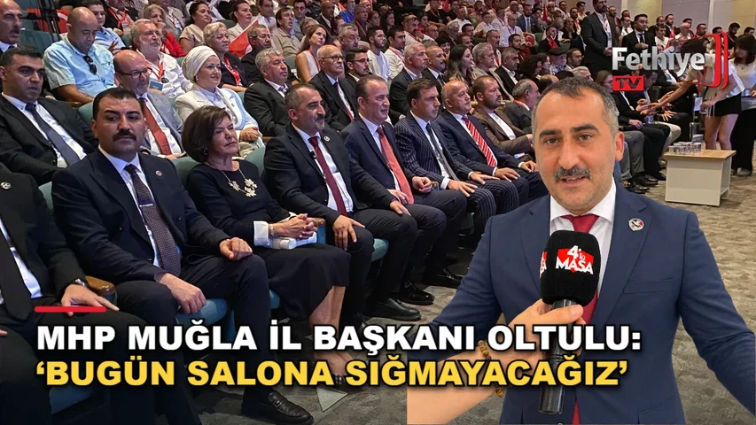MHP Muğla İl Başkanlığı'nın 15. Olağan Kongresi'nde konuşan İl Başkanı Emrah Oltulu ve partililer