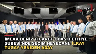 İMEAK Deniz Ticaret Odası Fethiye Şubesi Başkanı İlkay Tugay, seçim öncesi adaylık açıklamasında üyeleriyle birlikte görüntüleniyor.