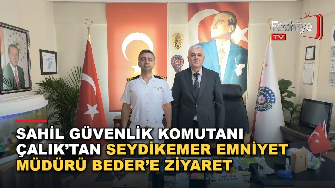 Seydikemer İlçe Emniyet Müdürü Turgut Beder'i ziyaret eden Sahil Güvenlik Komutanı Gökhan Çalık