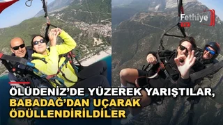 Ölüdeniz'de düzenlenen Fethiye Spor Festivali'ne katılan genç sporcular yamaç paraşütü heyecanı yaşadı