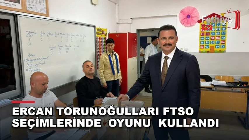 Fethiye Ticaret ve Sanayi Odası seçimlerinde oy kullanan Ercan Torunoğulları ve adaylar.