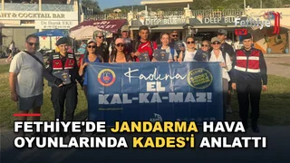 Fethiye İlçe Jandarma kadın astsubaylar Ölüdeniz Hava Oyunları Festivali'nde KADES tanıtımı yaptı