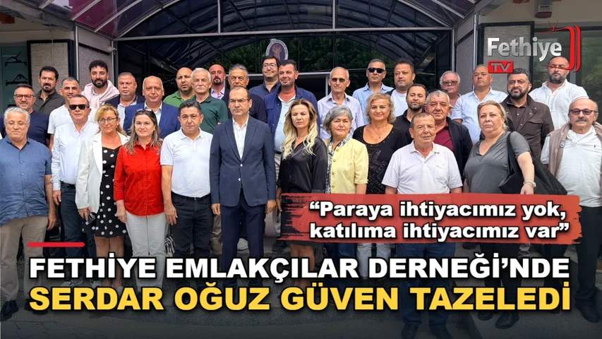 Fethiye Emlakçılar Derneği genel kurulunda başkanlığa yeniden seçilen Serdar Oğuz ve üyeler.