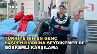 Türkiye'nin en genç başpehlivanı Muhammet Enes Özcan, Seydikemer'de araç konvoyu ile karşılandı.