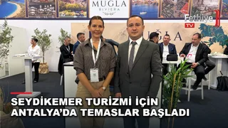 Seydikemer Belediyesi yetkilileri Antalya Turizm Fuarı'nda ilçenin turizm potansiyelini tanıtıyor