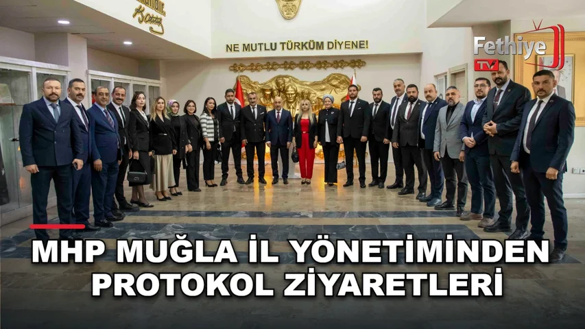 MHP Muğla İl Başkanı Emrah Oltulu'dan Vali İdris Akbıyık'a kırmızı beyaz gül takdimi