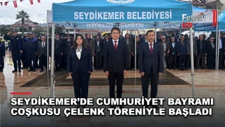 Seydikemer Kaymakamı Mustafa Dilekli ve protokol üyeleri Atatürk Anıtı önünde çelenk sundu