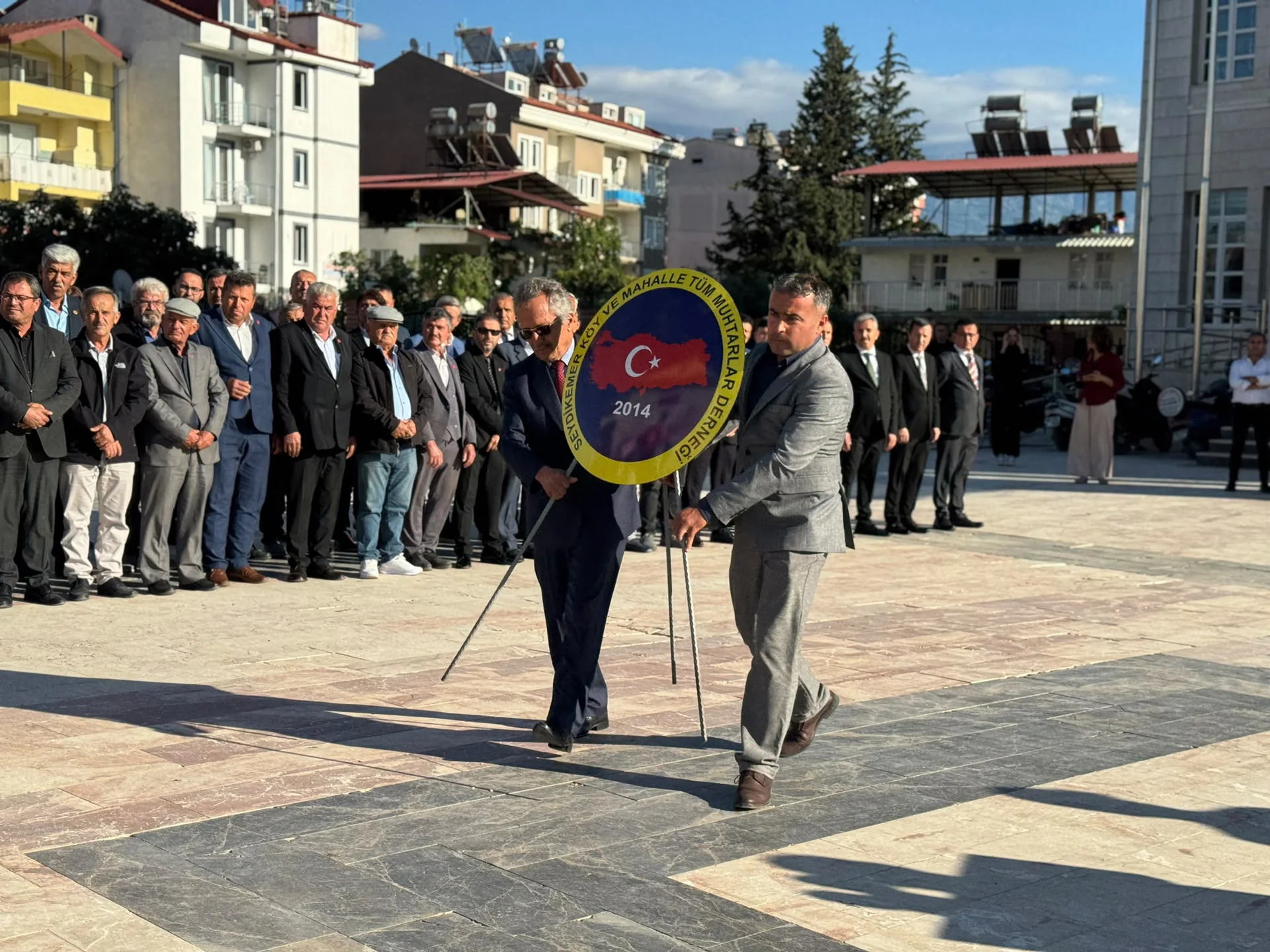 Seydikemer’de Muhtarlar Günü İçin Çelenk Sunuldu